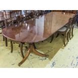 DINING TABLE, Regency style mahogany with turned pedestals and two extra leaves on tripod supports,