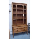 BOOKCASE, oak enclosing shelves above two long drawers on cabriole supports,