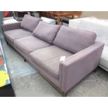 SOFA, three seater, in violet fabric on square supports, 279cm L.