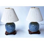 LAMPS, two, Chinese ceramic blue and white ginger jar form with wooden bases, 52cm H.