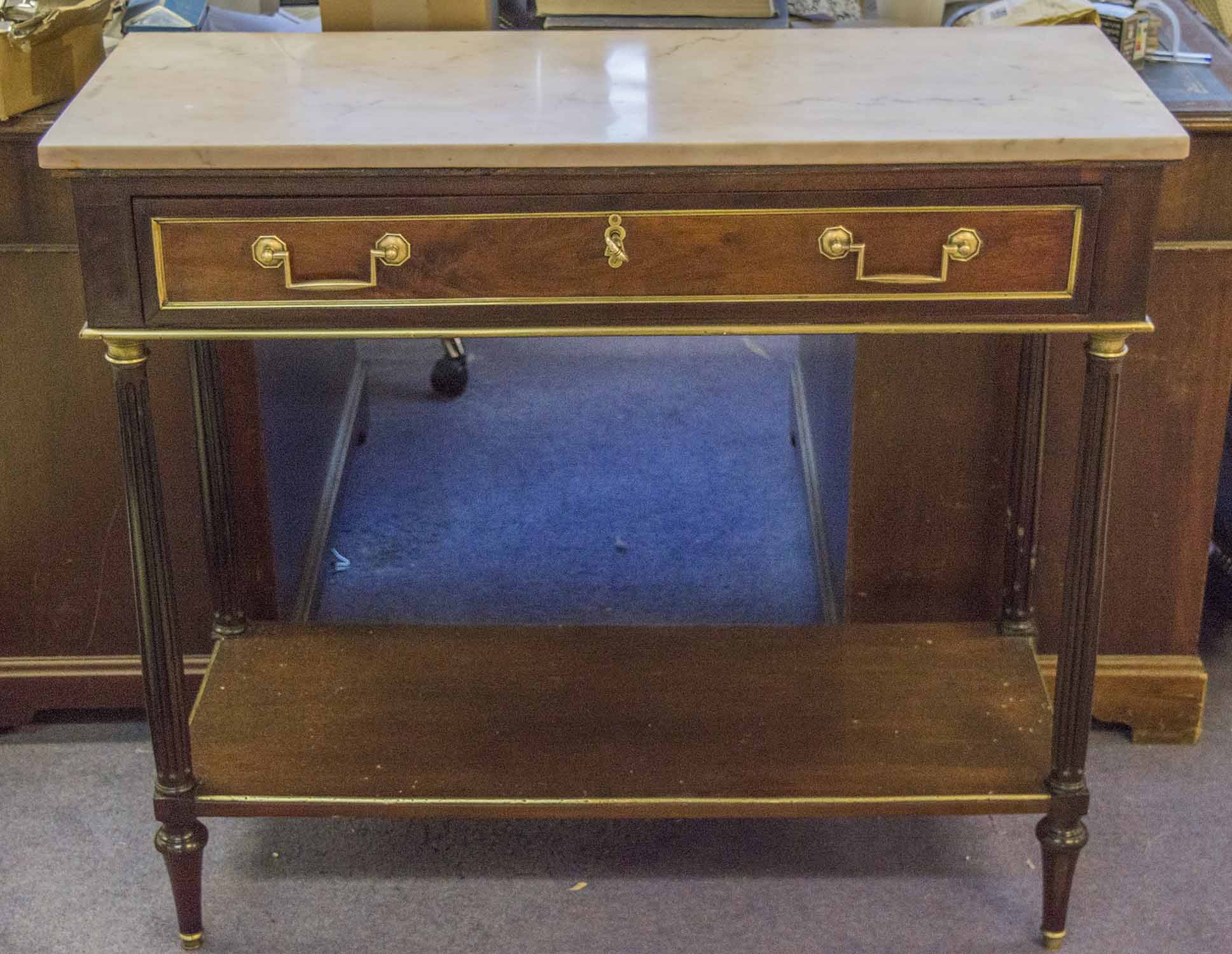 CONSOLE DESSERTE, Directoire mahogany and brass mounted with marble top and frieze drawer,