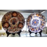 IMARI PLATES, a set of two, late 19th/early 20th century, largest 31cm diam.