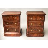 BEDSIDE CHESTS, a pair, Victorian figured walnut each adapted with three graduated drawers,