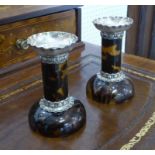 CANDLESTICKS, a pair, small tortoiseshell and silver with loose sconces, 8.5cm H.