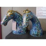 HORSES HEADS, a pair, polychrome cloisonne in the Chinese manner, 34cm H.