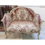 CANAPE, Louis XV style with a carved and painted showframe in needlepoint upholstery,