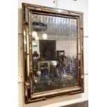 WALL MIRROR, Italian circa 1950's painted faux bamboo frame with sectional marginal plates,