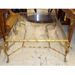 LOW TABLE, brass and glass with faux bamboo frame on swan neck supports, 102cm x 133cm L x 42cm H.