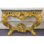 CONSOLE TABLE, Louis XV giltwood with modern green marble top above a foliate,