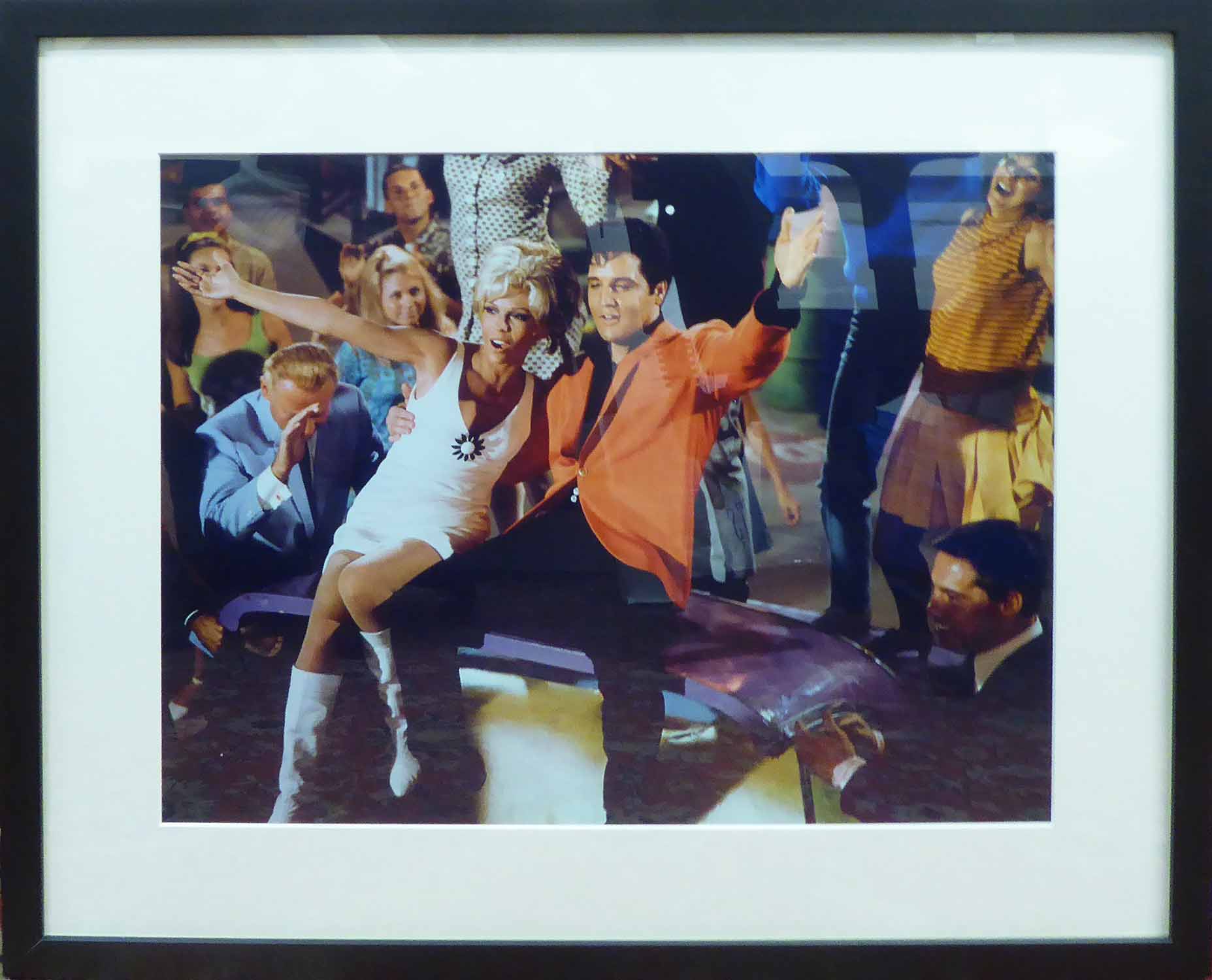 ELVIS WITH NANCY SINATRA, on the set of Speedway 1966 singing 'Viva Las vegas', 45cm x 60cm,