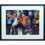 ELVIS WITH NANCY SINATRA, on the set of Speedway 1966 singing 'Viva Las vegas', 45cm x 60cm,
