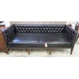 SOFA, Regency style in buttoned back black leather, 240cm W.