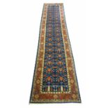 FINE KHOTAN DESIGN RUNNER, 368cm x 75cm, stylised pomegranite design within corresponding borders.