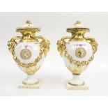 FURSTENBURG PORCELAIN CACHE POTS, a pair, white and gilt glazed with rams mask handles, 26cm H.