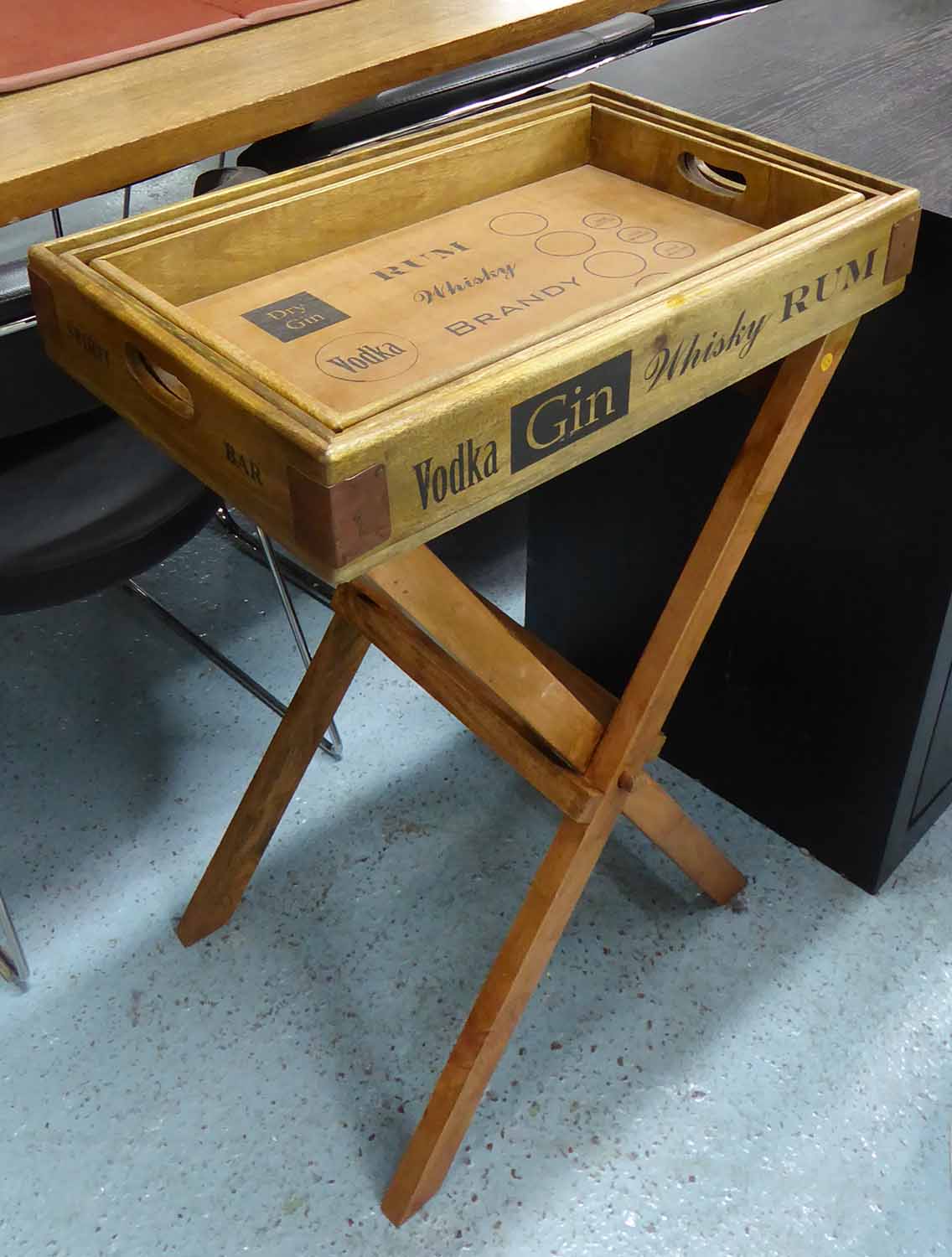 COCKTAIL BAR TRAY SET ON STAND, with three trays, 56cm W largest.