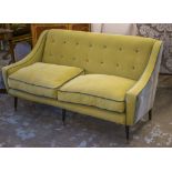 SOFA, circa 1950, ebonised in Designers Guild green chenille and velvet upholstery, 160cm W.