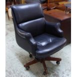 DESK CHAIR, by Fratelli Mascheroni black leather, swivel on mahogany bases with castors,