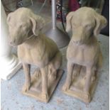 DOG STATUES, a pair, Cotswold stone weathered finish, 72cm H x 55cm L.