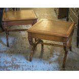 LAMP TABLES, a pair, Regency style mahogany with square brown leather tops on X frame supports,