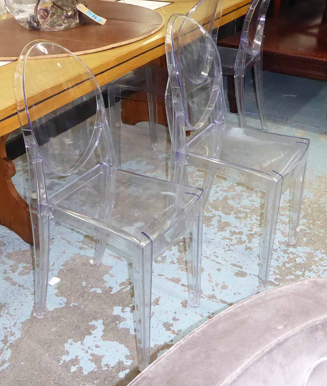 AFTER PHILIPPE STARCK VICTORIA GHOST STYLE CHAIRS, a set of eight, 92cm H.