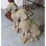 DOG STATUES, a pair, vintage Cotswold stone style, weathered finish, 72cm H x 55cm.