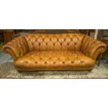 CHESTERFIELD SOFA BY TETRAD, buttoned tan leather on ribbed feet, 228cm W.