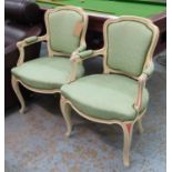 FAUTEUILS, a pair, painted cream show frames with pink detail and green upholstery, 62cm x 92cm H.