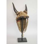 HEADDRESS, West African horn and shell decorated, 60cm H.