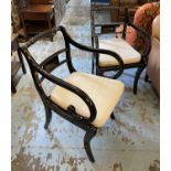 PAIR OF OPEN ARMCHAIRS, Regency style, ebonised with gilt detail and caned seats, each 50cm W.