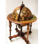 GLOBE COCKTAIL CABINET, in the form of an antique globe on stand with rising lid, 110cm H.