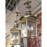 HALL LANTERNS, a pair, brass with glass panels and four lights, 59cm H x 21cm.