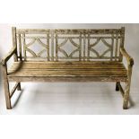 GARDEN BENCH, weathered teak of slatted form with lattice back, 150cm W.