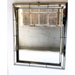 WALL MIRROR, mid 20th century gilt metal framed with raised marginal plate border, 110cm H x 92cm W.