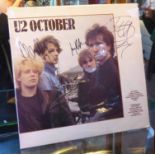 U2 OCTOBER LP, fully signed by the members of the band.