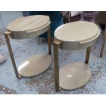 BEDSIDE TABLES, a pair, the gloss oval top on bronze supports, 66cm x 66cm H x 43cm.