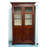 CHALON CABINET, with a pair of chicken wire doors enclosing shelves over a pair of panelled doors,