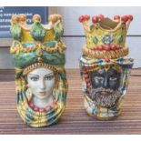 CALTAGIRONE MAIOLICA VASES, a set of two, in the form of a Moorish man and woman, signed at base,