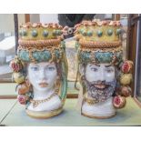 CALTAGIRONE MAIOLICA VASES, a set of two, in the form of a Moorish man and woman, signed at base,