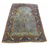 ANTIQUE KERMAN RUG, 225cm x 145cm, tree of life and bird design within matching borders.