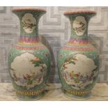 CHINESE CERAMIC VASES, pair, baluster form, green ground, Famille Rose decorated,