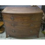 BOWFRONT CHEST, George III mahogany, circa 1800, with brushing slide above three drawers,