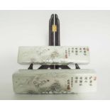 ASIAN BRUSH RESTS, porcelain, snowy mountainous landscape scenes, pagoda and figures,