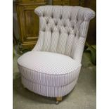 BOUDOIR CHAIR, in buttoned ticking on castors, 70cm W.