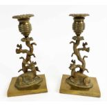 CANDLESTICKS, a pair, Regency polished bronze, Circa 1825, of stag and doe design, 19cm H.