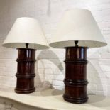TABLE LAMPS, a pair, turned hardwood with height adjustable fittings and linen shades, 100cm H max.