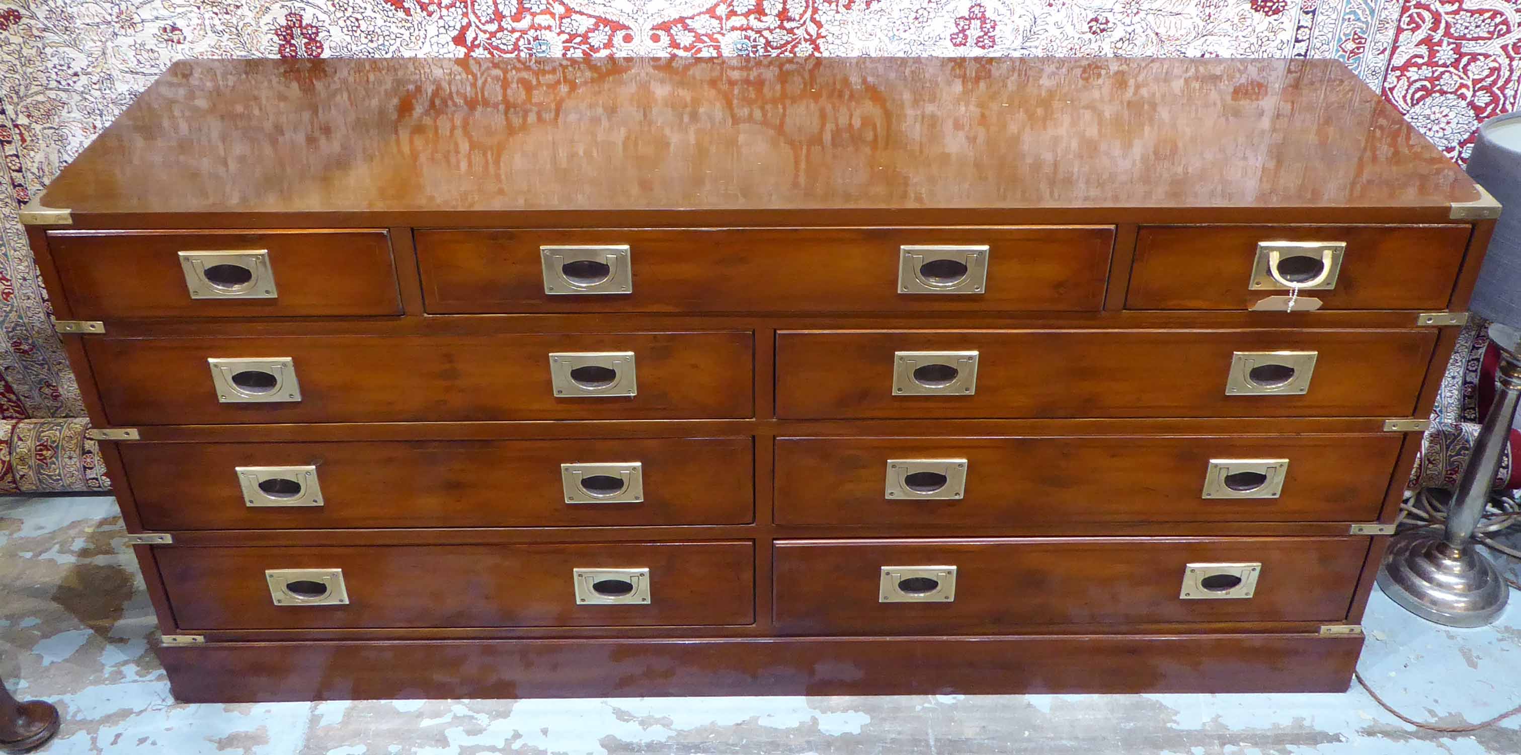 CAMPAIGN STYLE CHEST, yewwood and brass bound having nine drawers, 150cm x 43cm x 70cm H.