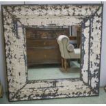 WALL MIRROR, American painted tole with square plate and distressed repoussé anthemion frame,