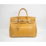 BIRKIN STYLE CROCODILE HANDBAG, by Gio Genco with silver tone hardware and bottom feet,