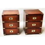 BEDSIDE CHESTS, a pair, Campaign style yewwood and brass bound each with three drawers,