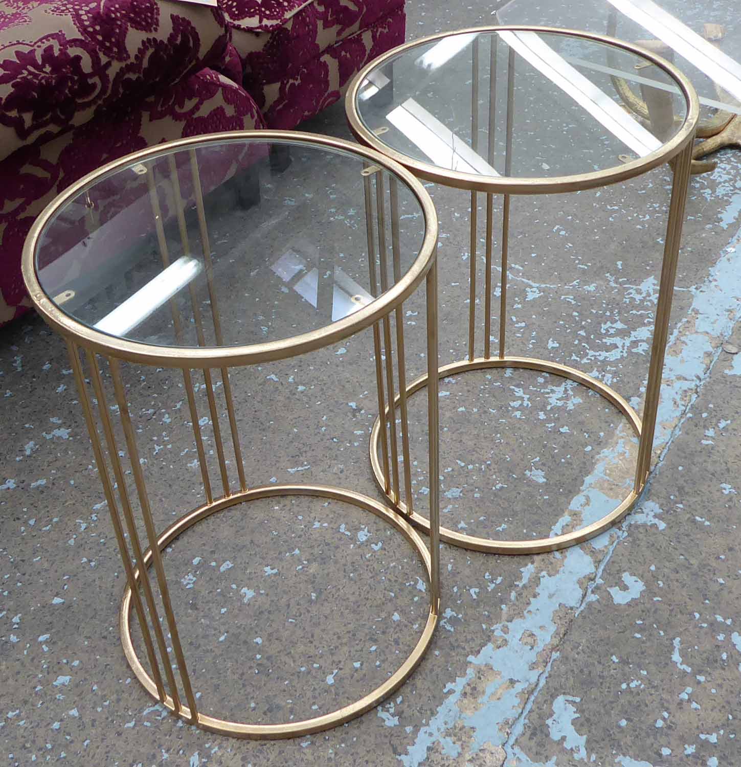 SIDE TABLES, a pair, 1950's French inspired, 56cm x 41cm diam.